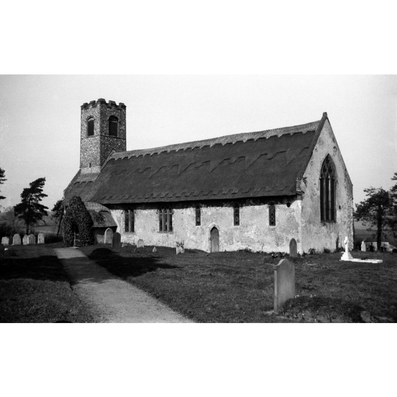 Photo caption: "The nave runs back to the west wall of the tower, thus enclosing it on three sides"