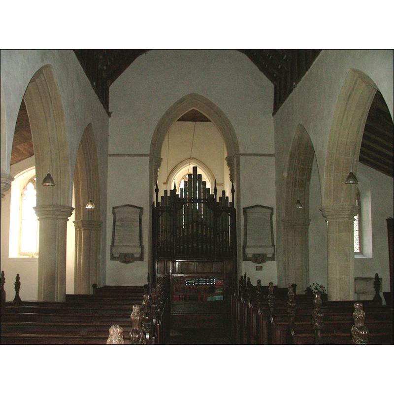 the font is partially visible at the west end of the north aisle [left of the photograph]