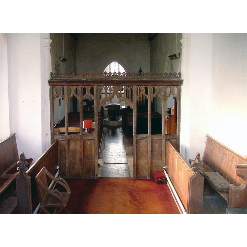 the font is discernible at the west end of the nave