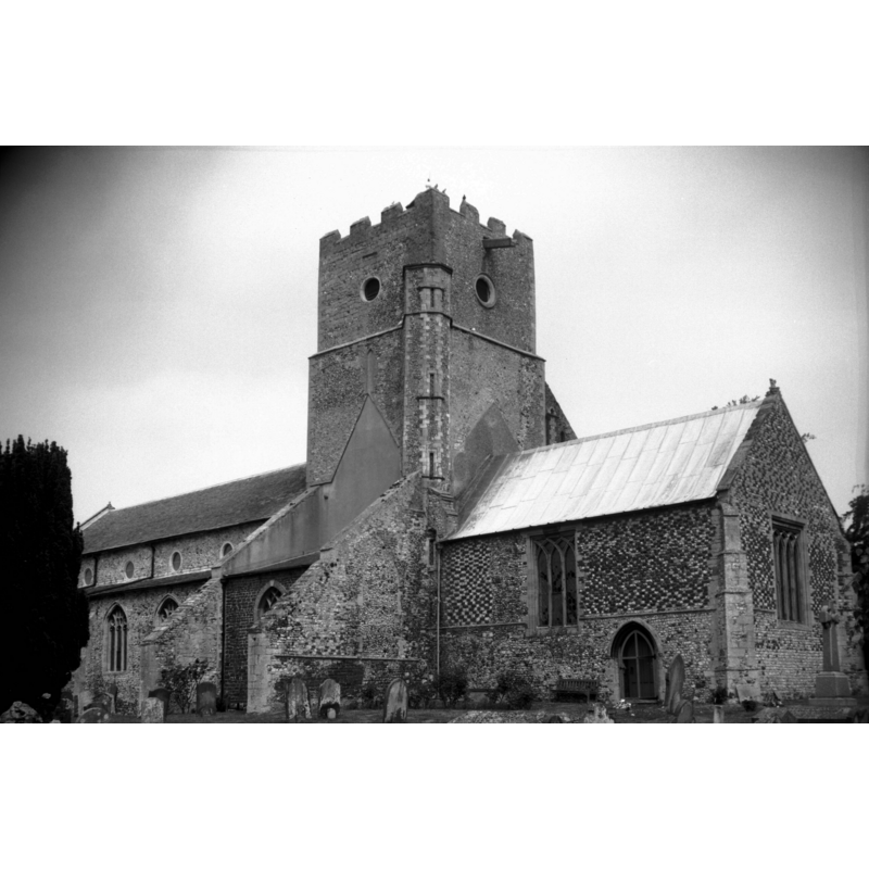 Photo caption: "Late 13c crossing tower and nave"