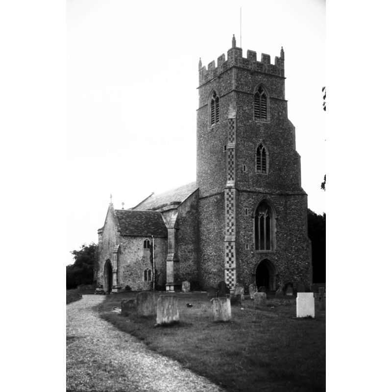 Photo caption: "Buttresses of the 14c tower have chequered pattern"