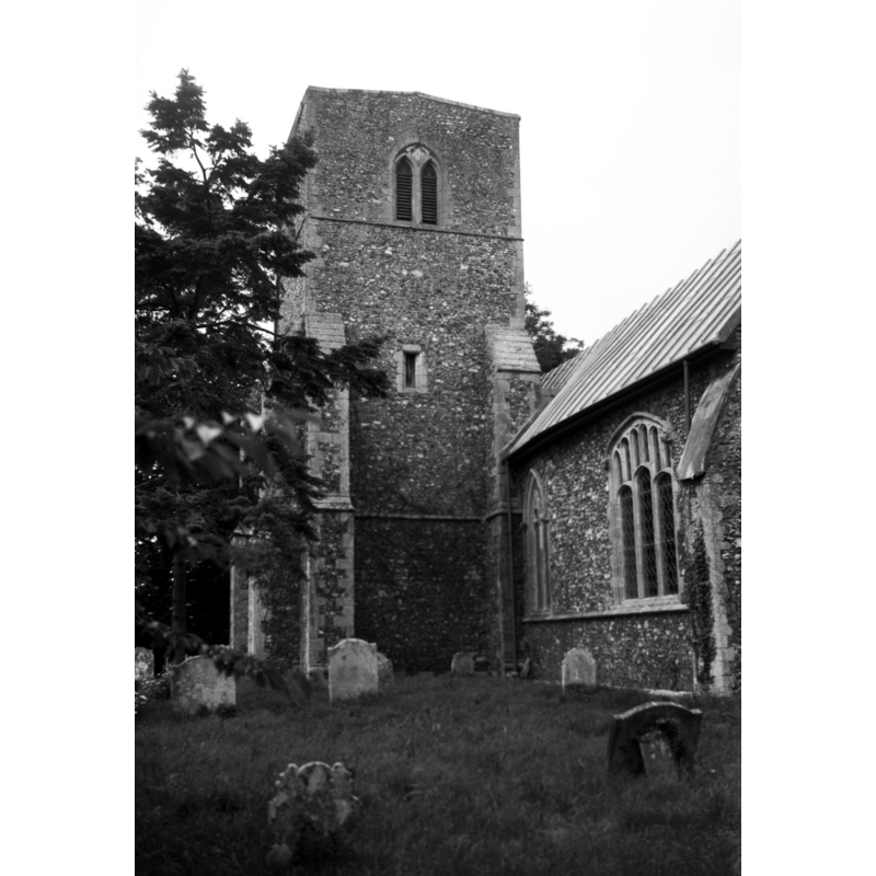 Photo caption: "All of c1300 to the later 14c. The south-west tower includes a porch"
