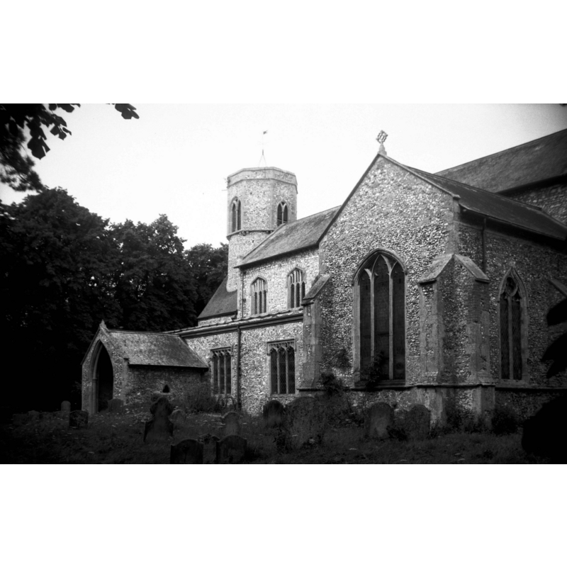 Photo caption: "The round tower is probably Norman, the remainder mostly 13c and 14c"