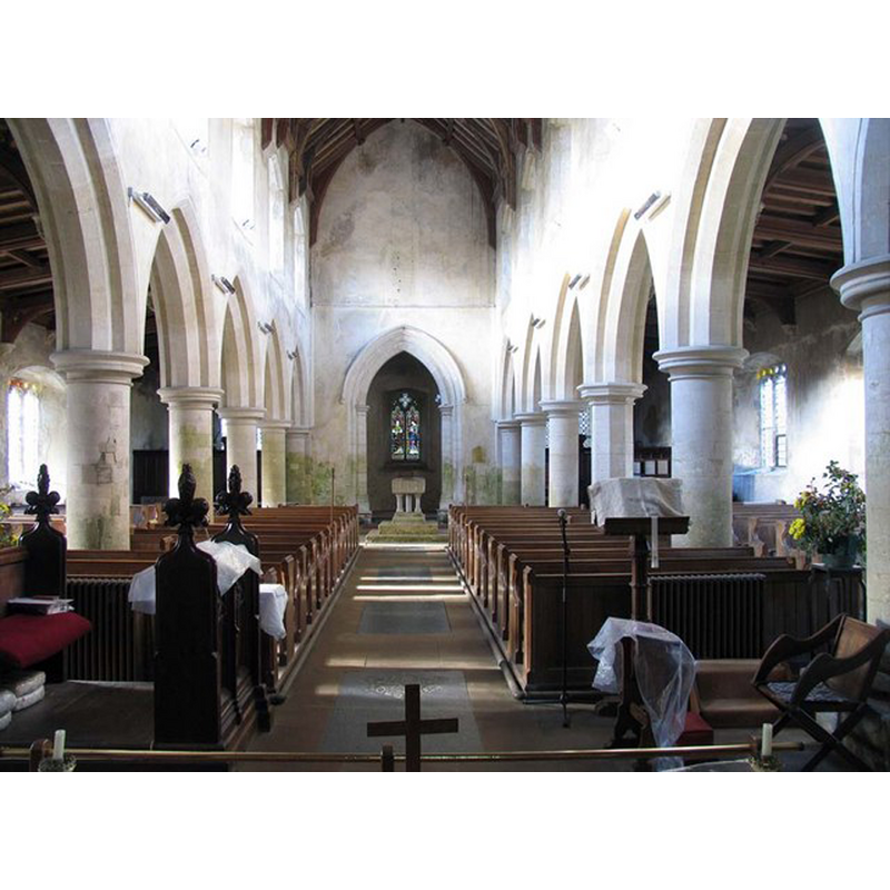 the font at the far [west] end of the nave