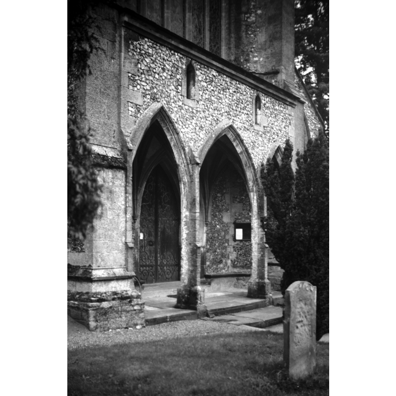 Photo caption: "At west end with three arches and groined"