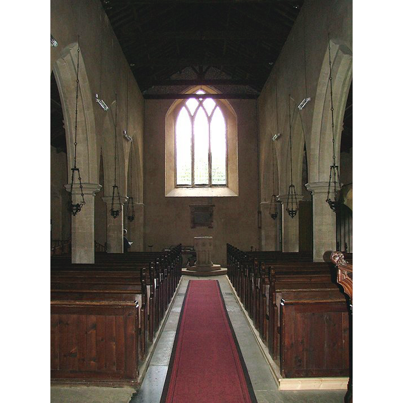 the modern font at the west end of the nave