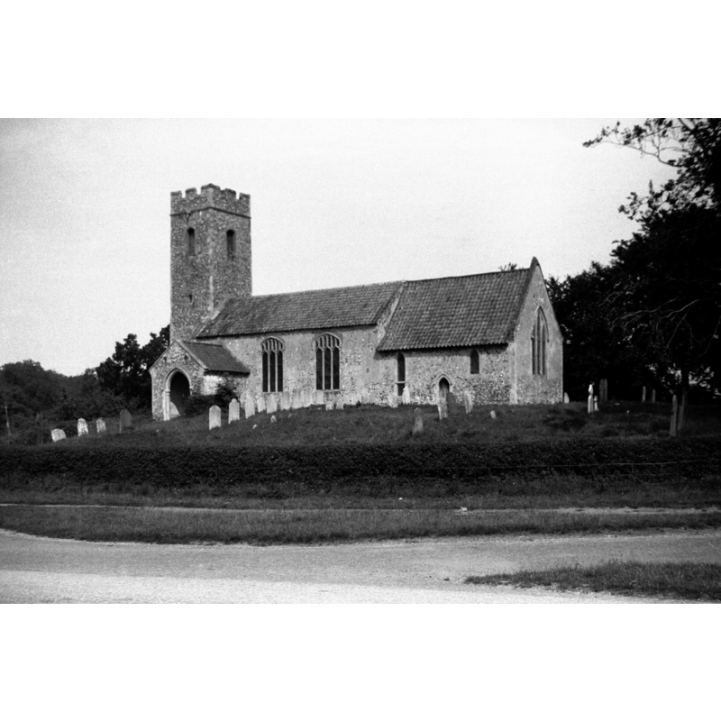 Photo caption: ""Slim unbuttressed west tower without datable details. Nave and chancel apparently of c1300 with Perpendicular additions." (Pevsner)"