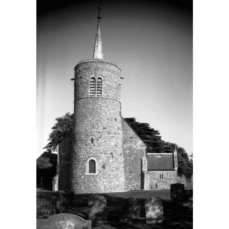Photo caption: "Norman round tower"