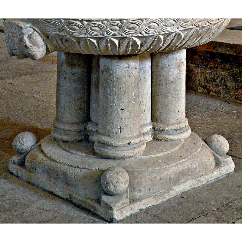 one on each corner of the square lower base [cf. FontNotes]
