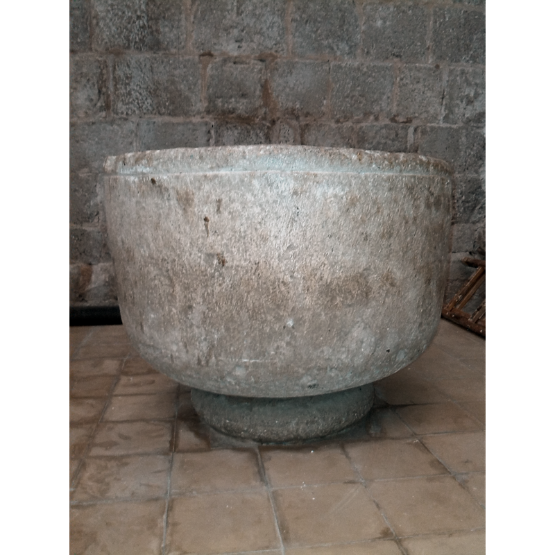 plain except for a moulding at the upper rim