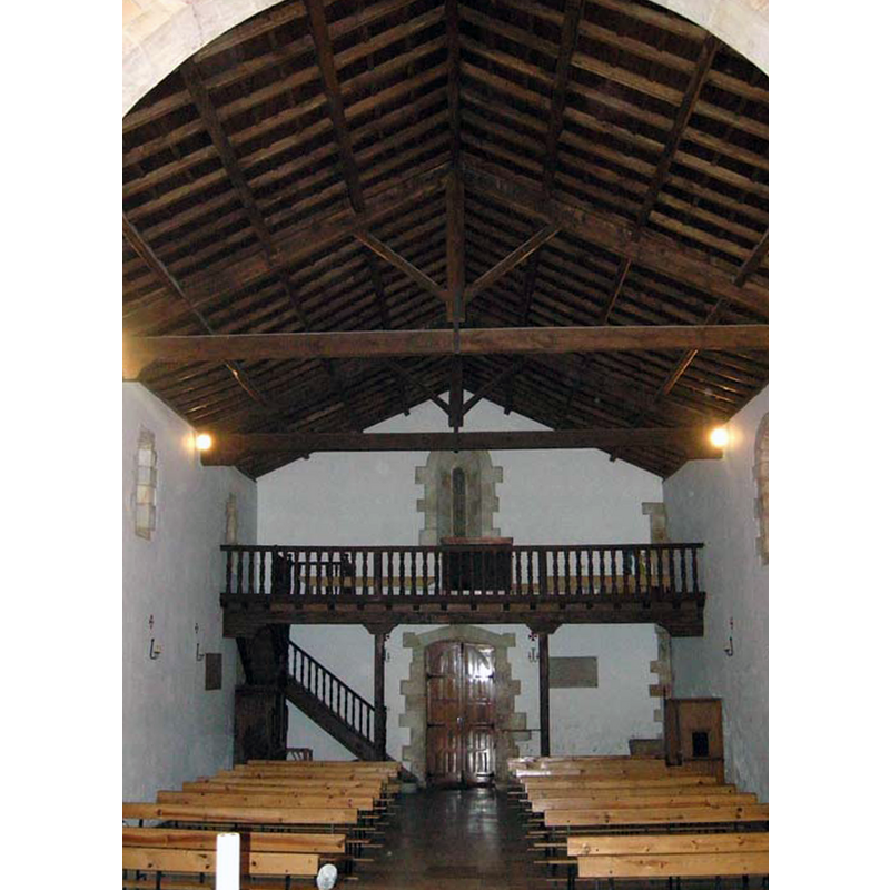 the font is located on the right [north] side, at the back [west] end, behind the confessional