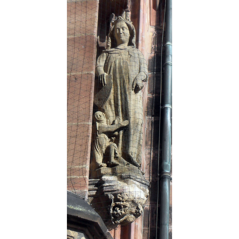Photo caption: "Figur Frau Welt rechts neben dem Südportal des Wormser Doms in Rheinland-Pfalz (Deutschland)"