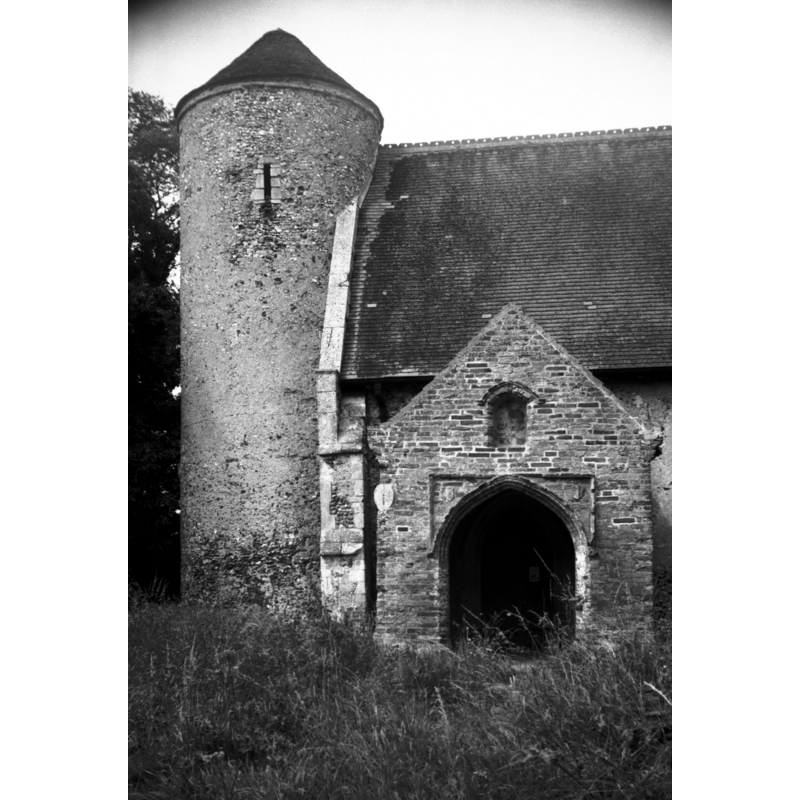Photo caption: "Norman round tower"