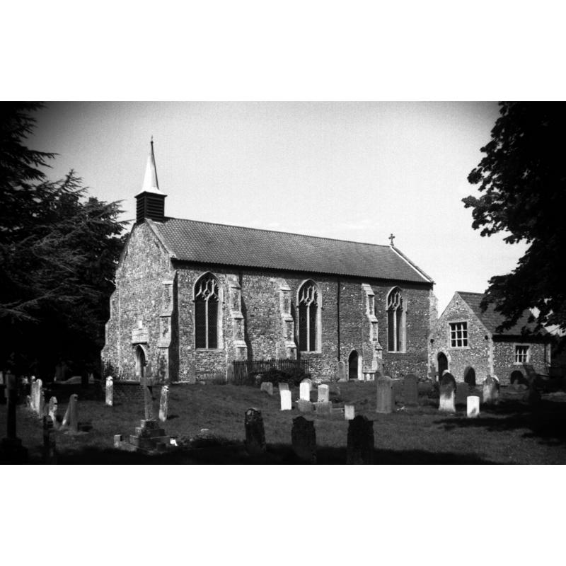 Photo caption: "The present church is only a portion of a much larger one of which the tower and most of the nave were taken down in 1790"
