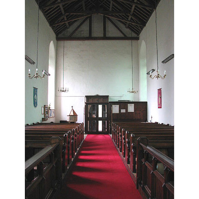 the top of the font and cover are visible at the far [west] end, left [south] side