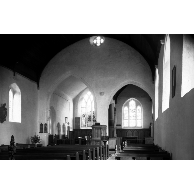 The church interior seen approximately two years before the 1981 fire -- Photo caption: "The church has the curious appearance of having two chancel arches. The great width of the nave (31 feet) shows that the south aisle has been absorbed"