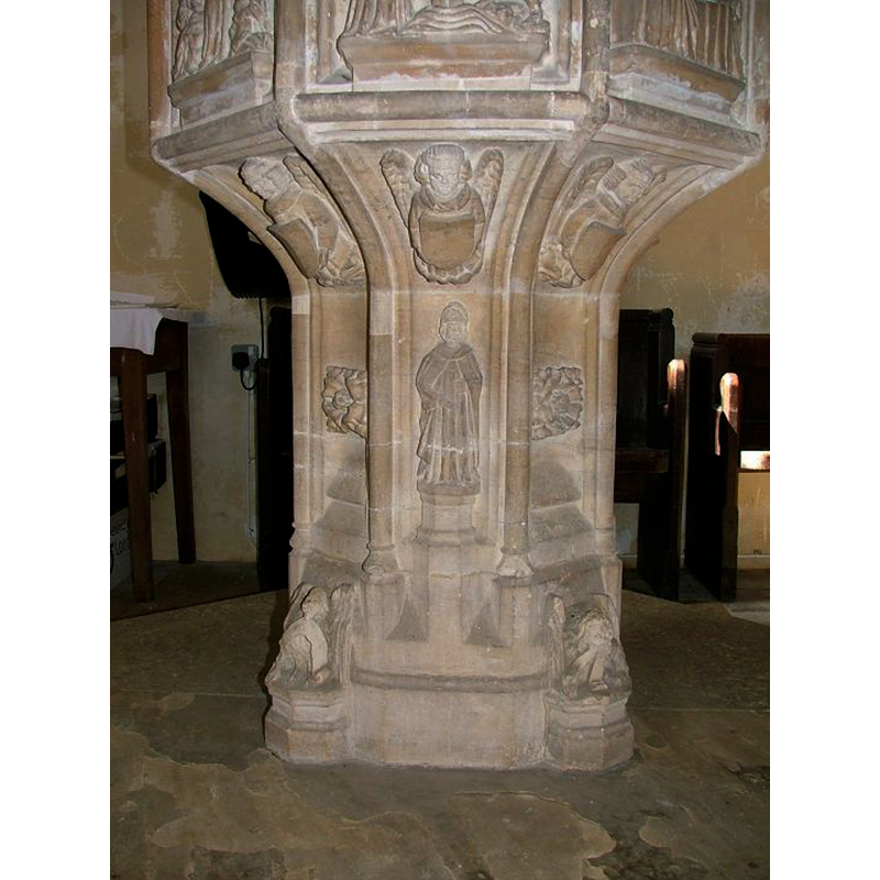 at the lower end of the base, at 90-degree angles [cf. FontNotes]