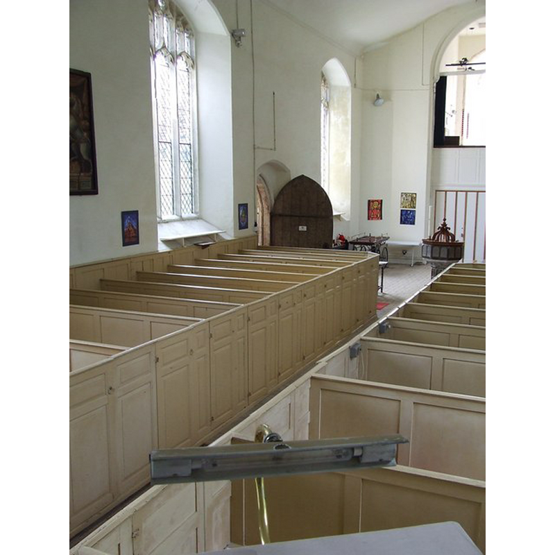 at the west rnd of the nave, opposite the south entranceway