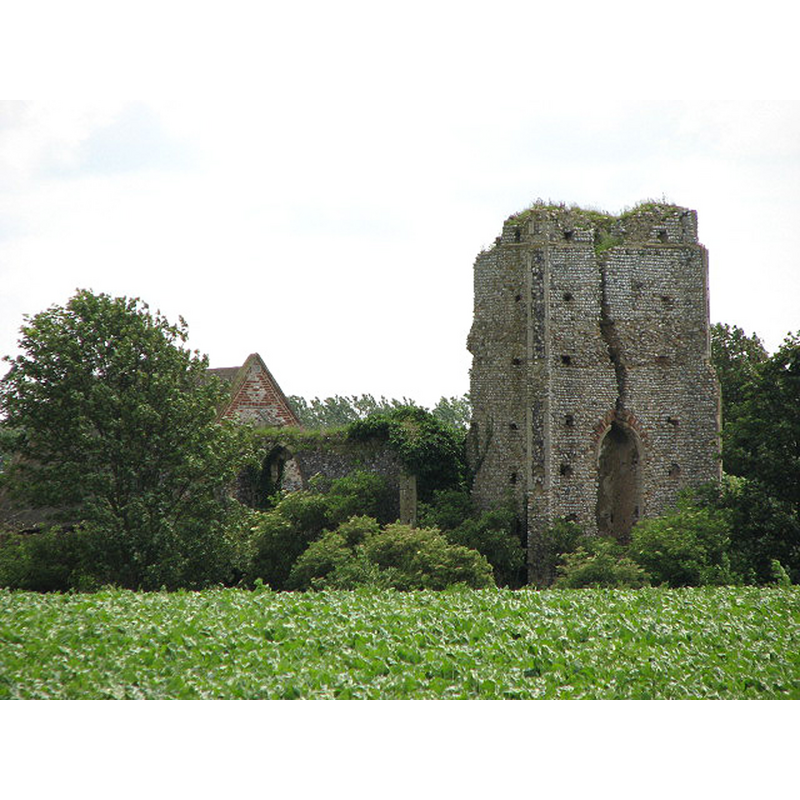 Photo caption: "The tower of All Saints church was struck by lightning in 1762 and has since fallen to ruin, with a large crack splitting the west tower wall almost in half. Falling masonry soon also destroyed the nave but the chancel was made safe; restored in the late 1800s it is still occasionally being used for worship."