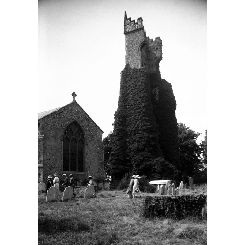 Walsham St Laurence's tower ruin in 1937 -- Photo caption: "Now collapsed, and east end of St Mary's church"