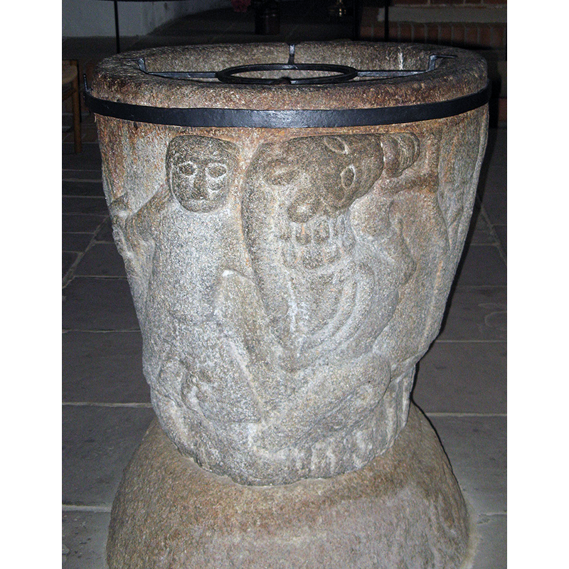 the metal band around the upper side of the basin is there for reinforcement of the cracked basin -- the metal insert visible in the inner well is the modern support for the baptismal dish [not shown]