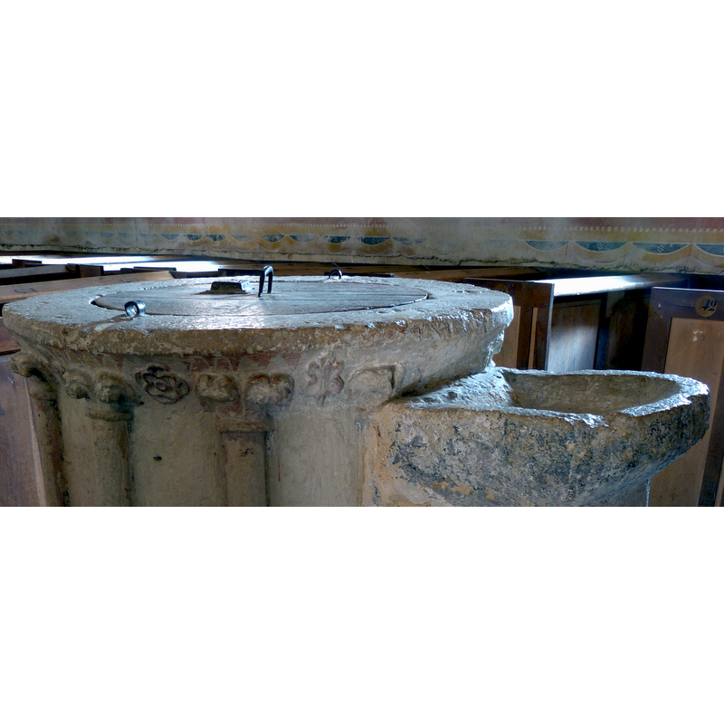 notice the round little arch-heads painted below the rim -- the area of the main basin where it joins with the secondary basin appears to have been chiseled off; this was probably done when the single old font was transformed into a double-font by cementing the secondary basin and pedestal to it [cf. FontNotes]
