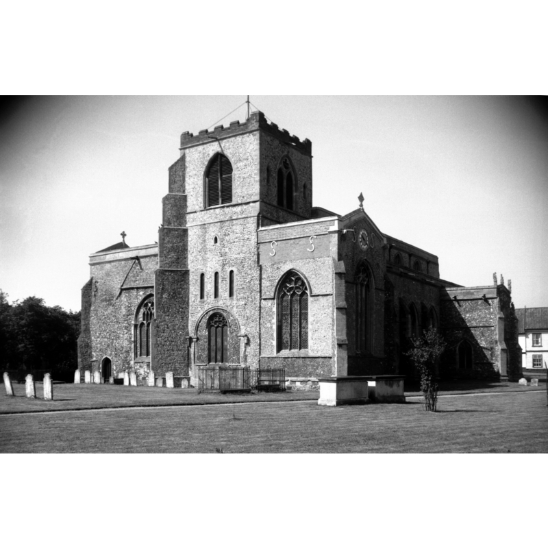 Photo caption: "Base of central tower Norman. Remainder of church early 15c"