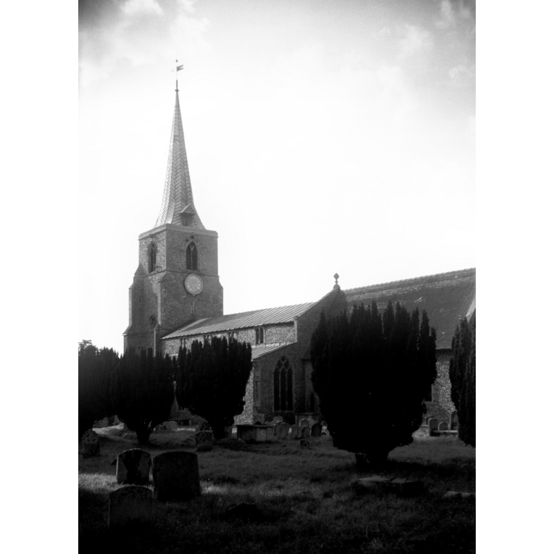 Photo caption: "14c tower and spire and sanctus bell in bellcote on east side of spire"