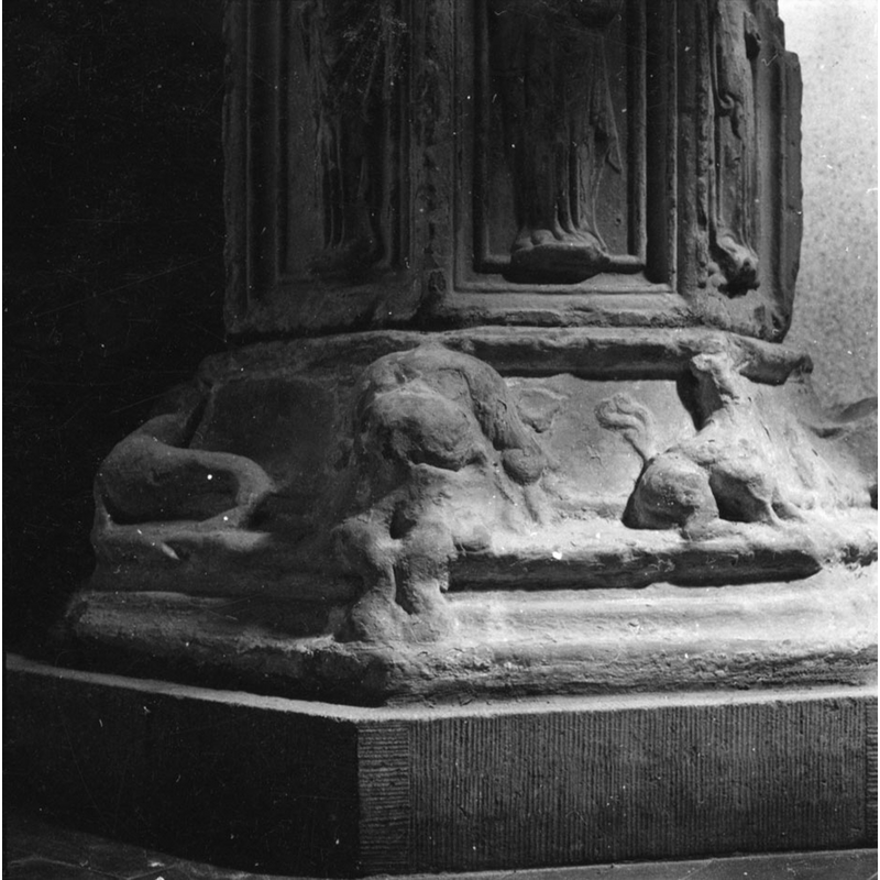 at the angles of the lower base; very worn and difficult to identify, though some may be regular animals