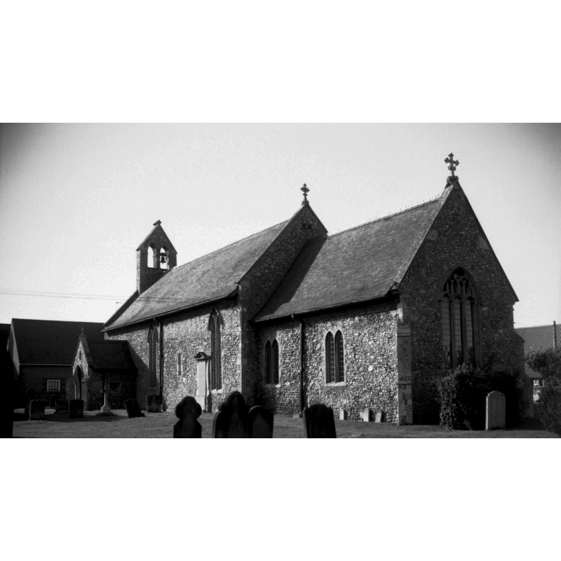 Photo caption: ""No tower, only a Victorian bellcote." (Pevsner)"