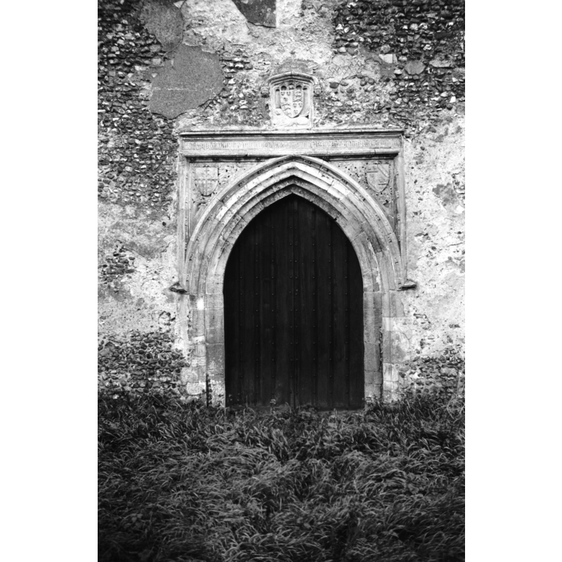 Photo caption: "With inscription to Robert Oxburgh who built the aisle"