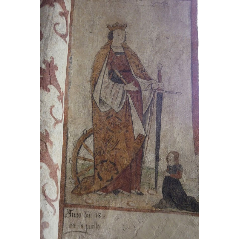 at St. Catherine's feet, on the right side, a kneeling woman; probably a donor -- on the left, below the saint, the date of the painting
