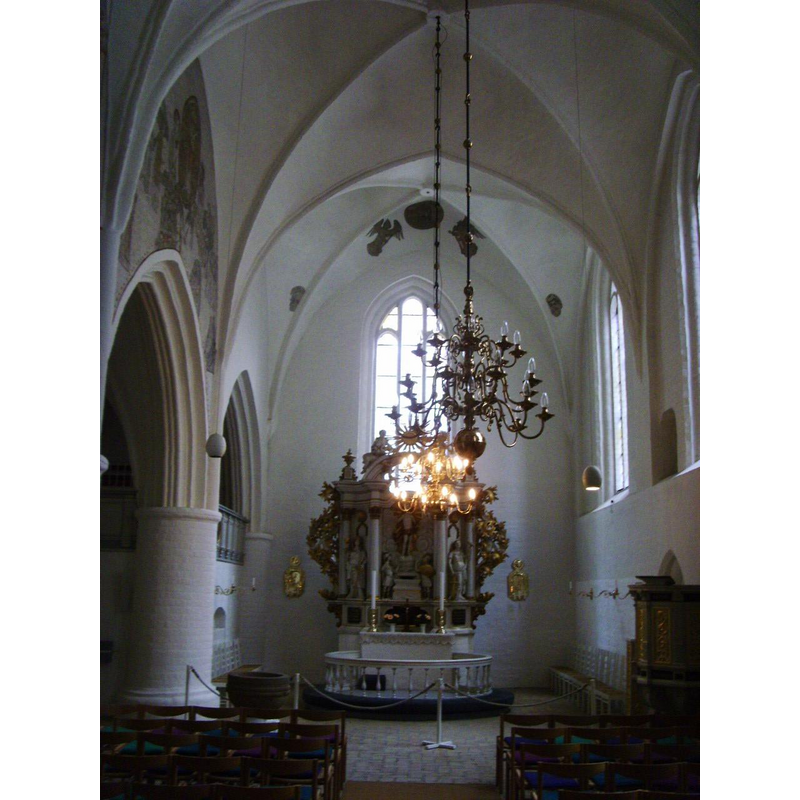 the old font is visible on the left [north] side, before the bank of benches