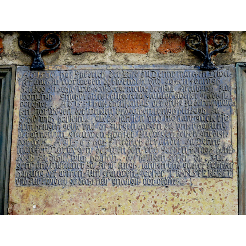 plaque above the entranceway