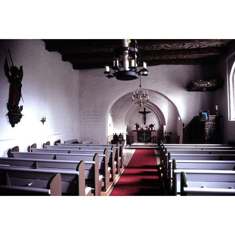 the font and cover are partially visible at the east end, by the left [north] side of the chancel arch