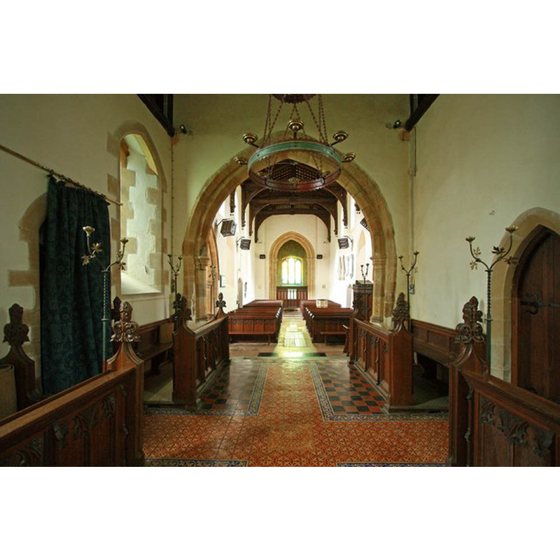 the modern font is partially visible about halfway down the nave, on the right [north] side