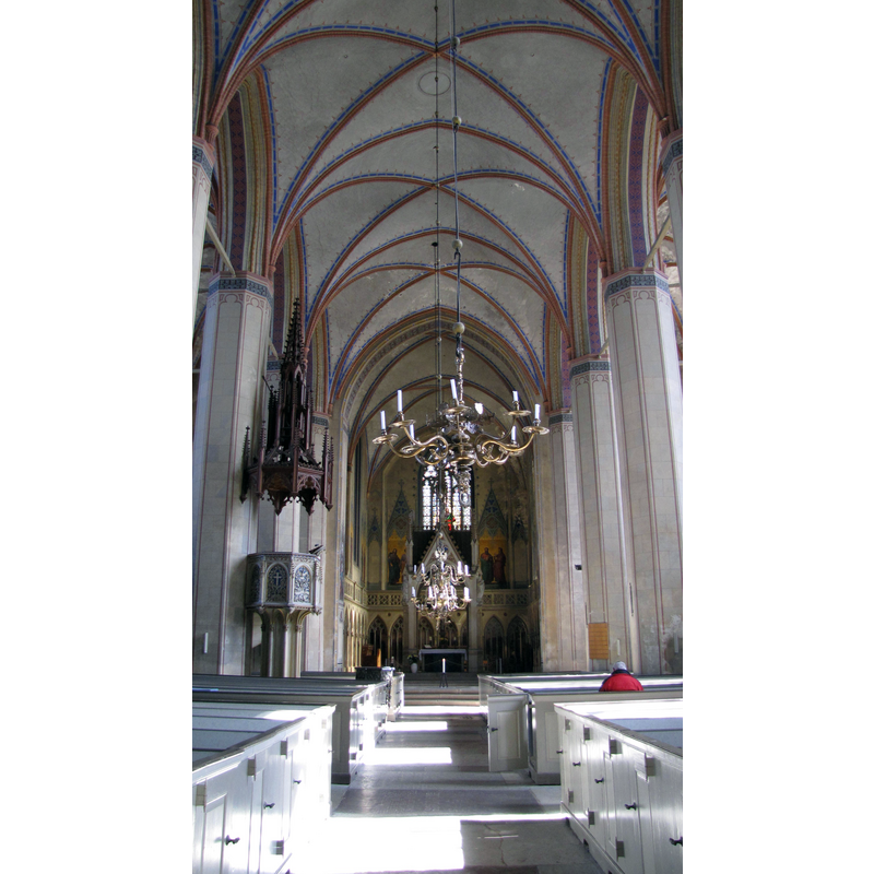 the top of the font is visible on the left, by the pulpit