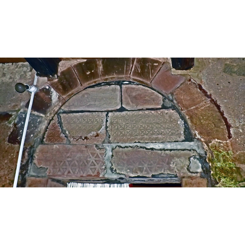 only the lower half remains, the patterned decoration