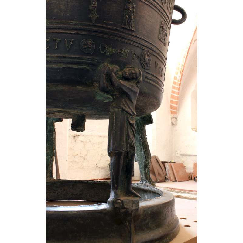 both hands supporting the font
