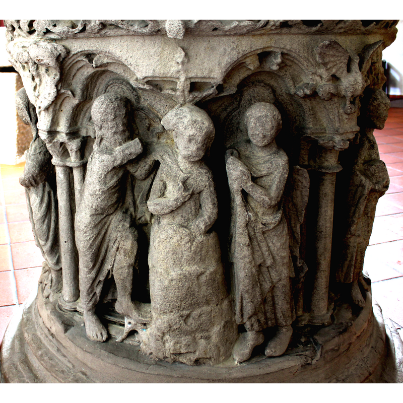 although the right arm of the Baptist is broken off, the hand is visible on Christ's head; the Holy Ghost symbol appears above Christ's head