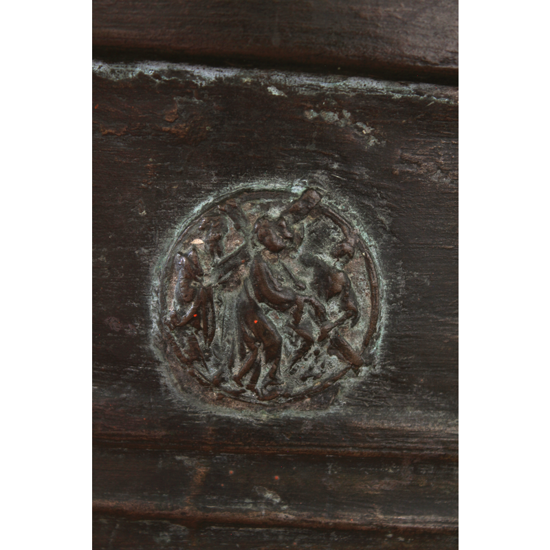 the figure to the right has a hand on the cross