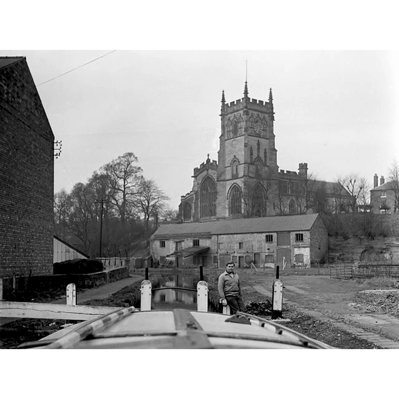 Source caption: The well-photographed church is beyond, but the point of interest is the canalside warehouse which has since been demolished. From a boat in Kidderminster Lock."