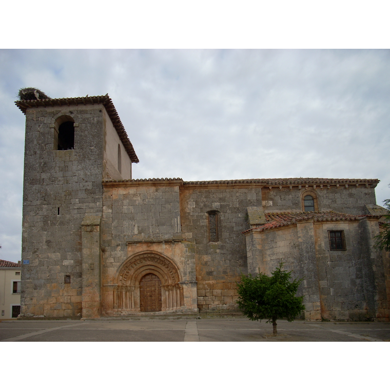 the south wall, portal and corbels are from the original Romanesque fabric of the later late-Gothic re-building