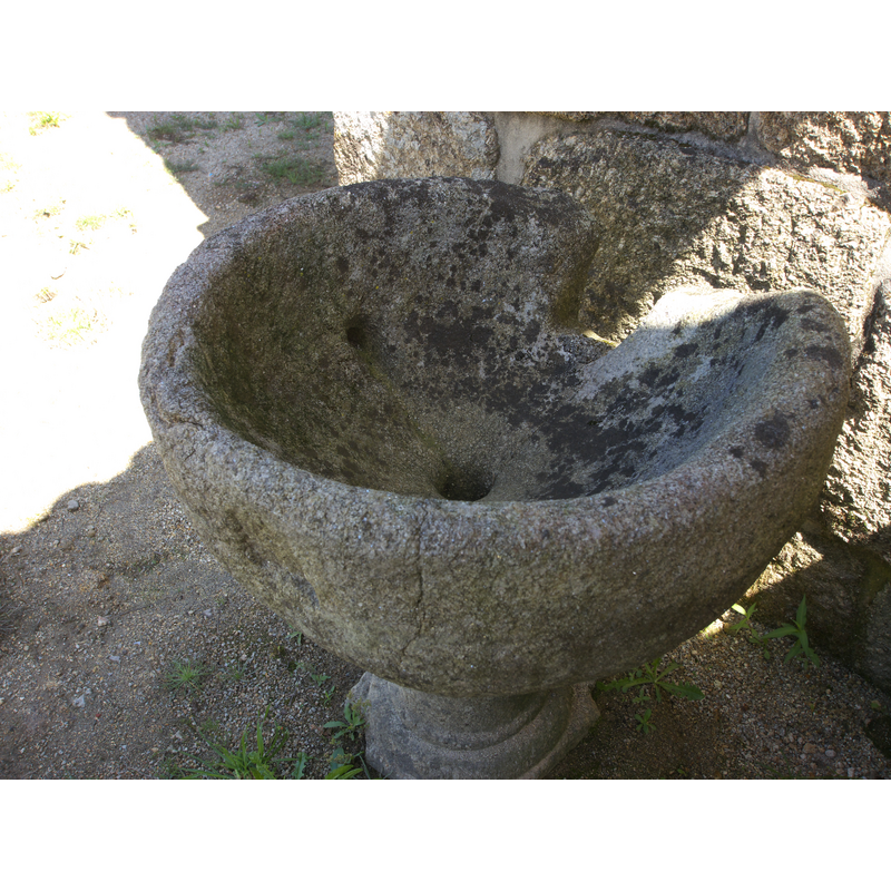 the old font -- notice the damage at the back and the two drain holes [cf. FontNotes]