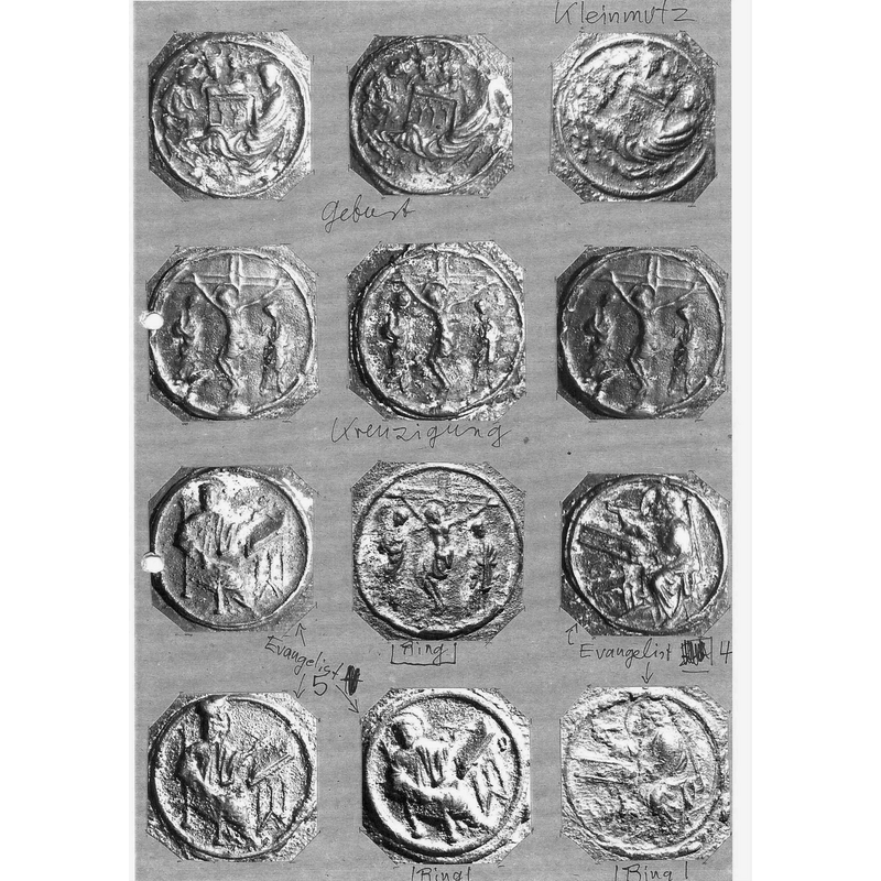 twelve of the medallions containing scenes, with some annotations: Evangelists, Nativity, Crucifixion, etc.