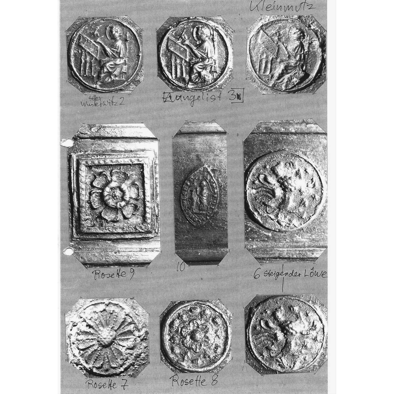 twelve additional items identified: three of the Evangelist medallions, three floral motifs, two rampant lions and the ecclesiastical seal