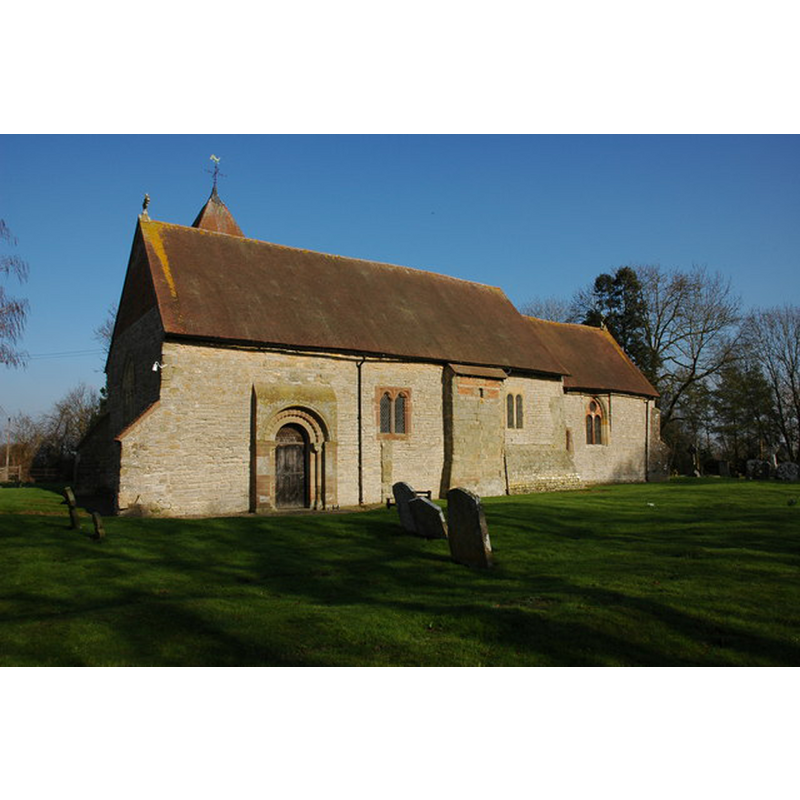 Source caption: "St Peter's church, Pirton, viewed from the south-west. The tower is situated on the northern side of the church and therefore from this aspect only the top is visible."