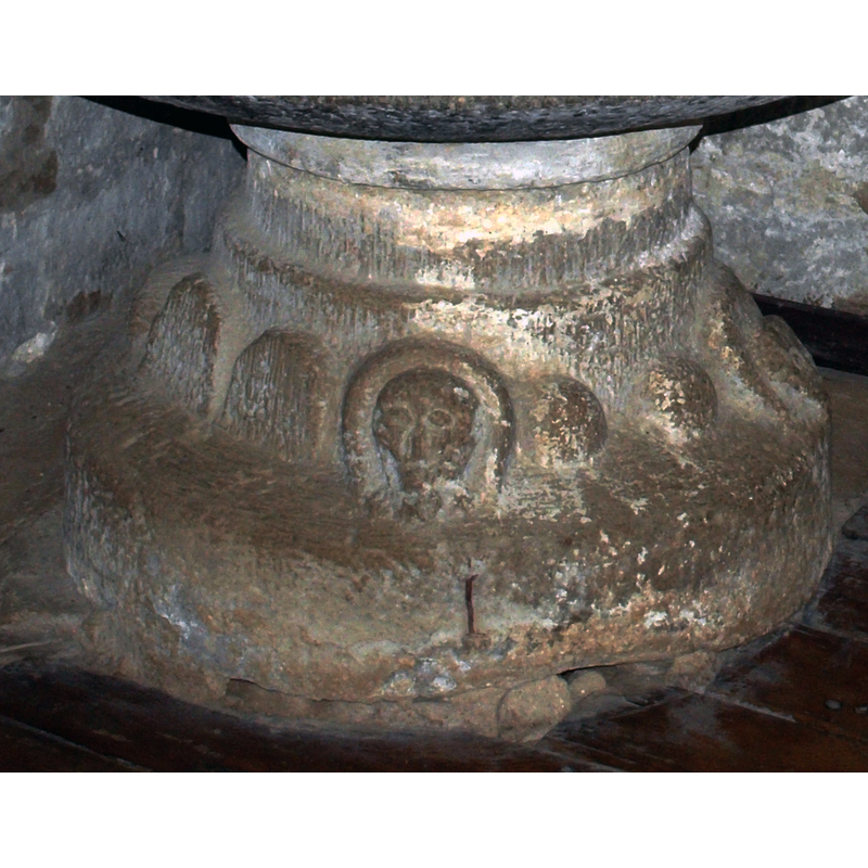 several -- notice the damage to the lower base of the font; notice also that the base has been buried partly below the flooring level