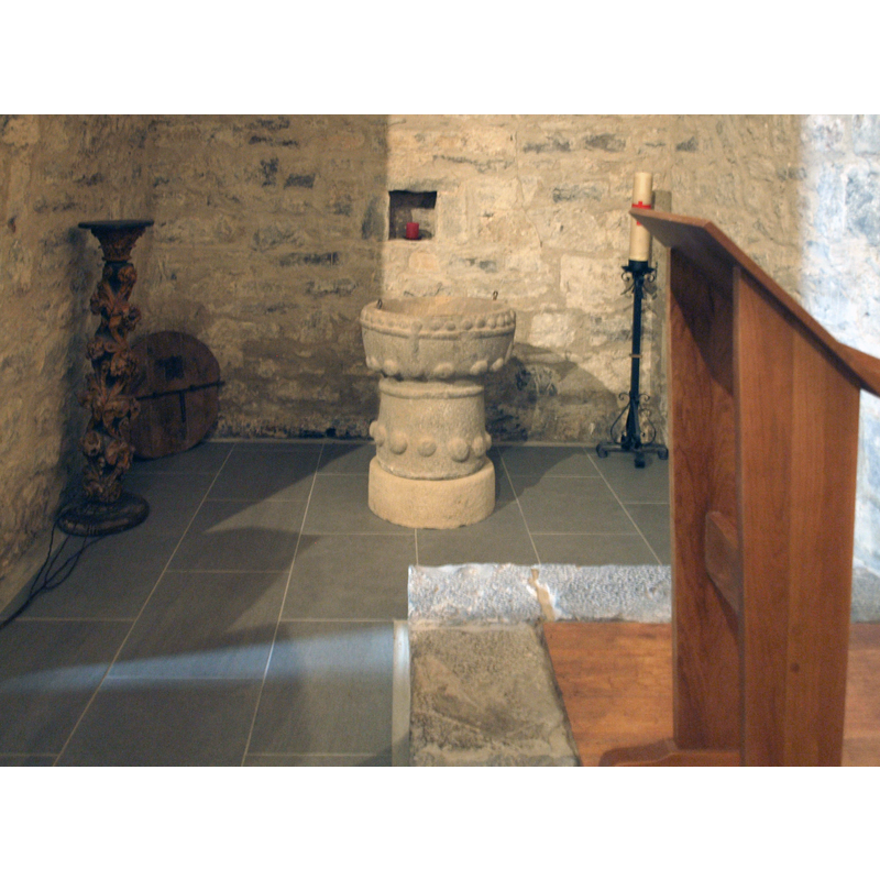 the cover is on the floor, in the left corner