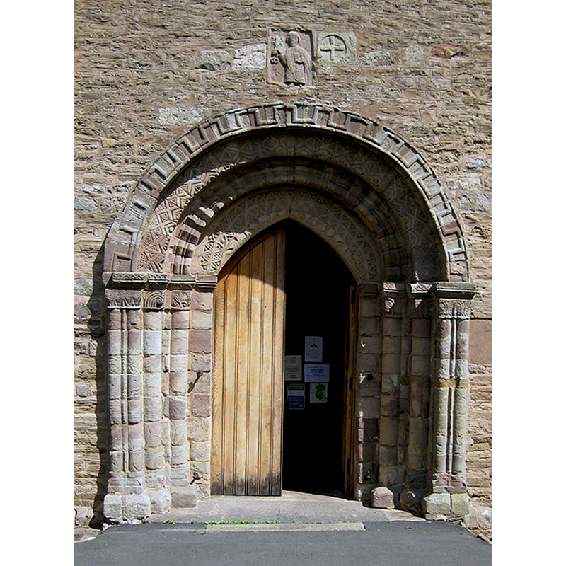 Source caption: "The south doorway, St Peter's Church, Bromyard. A minster existed on this site around 840 AD - it is possible the figure of St Peter over the doorway is from the pre-conquest period."